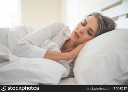Beautiful Young woman sleeping in bed