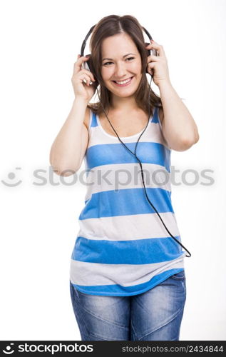 Beautiful young woman smiling and listen music, isolated over white background