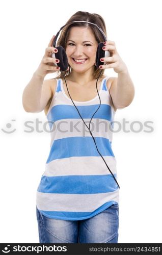 Beautiful young woman smiling and listen music, isolated over white background. Listen Music