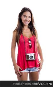 Beautiful young woman smiling and posing with a old vintage camera, isolated on white background