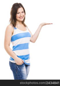 Beautiful young woman smiling and showing something on her hand, isolated over white background