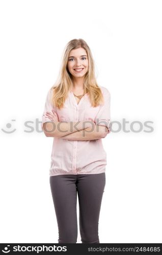 Beautiful young woman smiling and standing, isolated over a white background