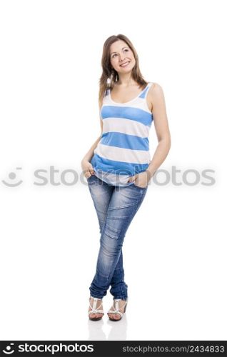 Beautiful young woman smiling and thinking, isolated over white background
