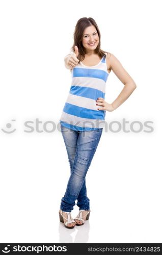 Beautiful young woman smiling with thumbs up, isolated over white background