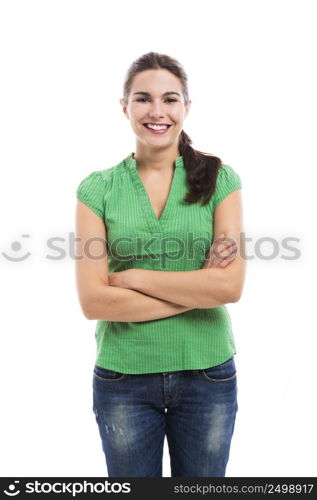 Beautiful young woman smilling, standing over a white background