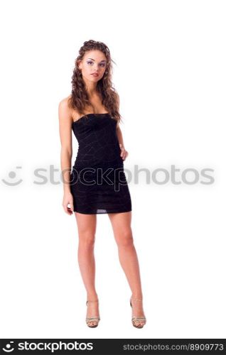 beautiful young woman standing wearing dress isolated on white