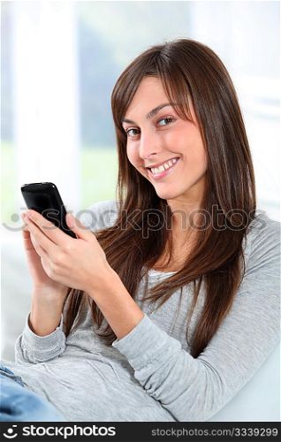 Beautiful young woman talking on mobile phone