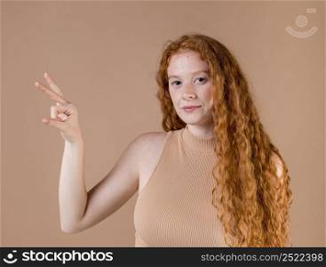 beautiful young woman teaching sign language 16