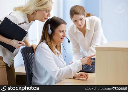 beautiful young woman telephone operator with headset