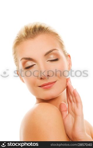 Beautiful young woman touching her face