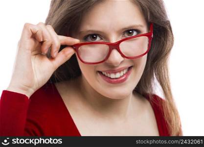 Beautiful young woman wearing glasses and smiling isolated over a white background