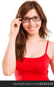 Beautiful young woman wearing glasses, isolated over copy space background