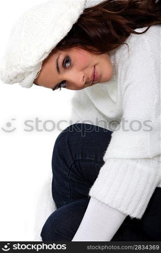 beautiful young woman wearing woolen clothes