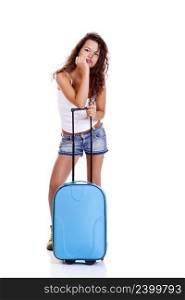 Beautiful young woman with a blue suitcase, isolated on white background