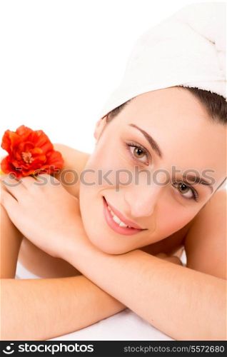 Beautiful young woman with a perfect skin, isolated over white background