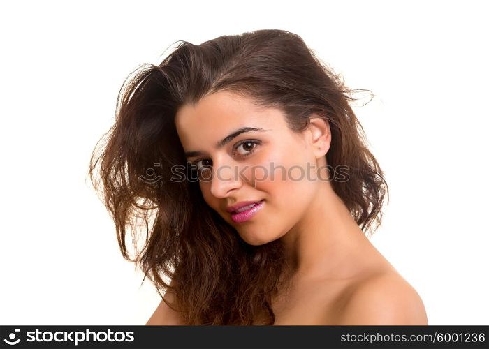 Beautiful young woman with a perfect skin, isolated over white background