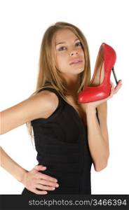 beautiful young woman with a red shoe on white