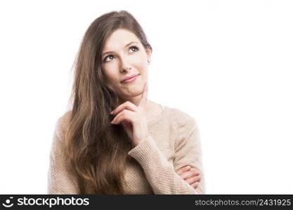 Beautiful young woman with a thinking expresison, isolated over white background