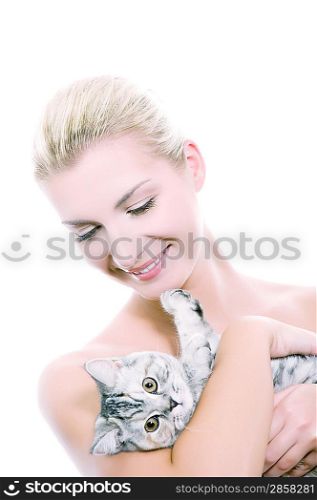 Beautiful young woman with adorable kitten