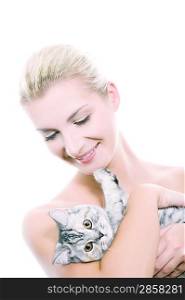 Beautiful young woman with adorable kitten