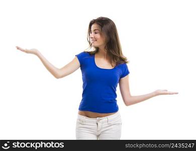 Beautiful young woman with arms open making a scale, isolated over a white background