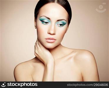 Beautiful young woman with bright make-up. Beauty fashion
