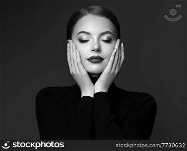 Beautiful Young Woman with Clean Fresh Skin. Perfect Makeup. Beauty Fashion. Cosmetic Eyeshadow. Girl in Black Turtleneck. Black and white photo