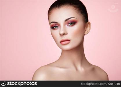 Beautiful Young Woman with Clean Fresh Skin. Perfect Makeup. Beauty Fashion. Eyelashes. Cosmetic Eyeshadow. Highlighting. Cosmetology, Beauty and Spa