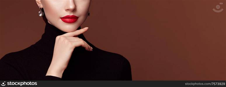 Beautiful Young Woman with Clean Fresh Skin. Perfect Makeup. Beauty Fashion. Red Lips. Cosmetic Eyeshadow. Girl in Black Turtleneck