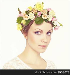 Beautiful young woman with delicate flowers in their hair