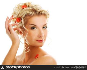 Beautiful young woman with flowers in her hair