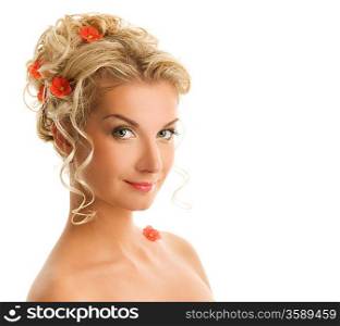 Beautiful young woman with flowers in her hair close-up portrait