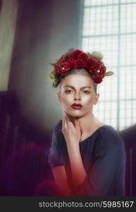 Beautiful young woman with flowers in their hair. Vogue.