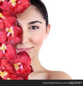 Beautiful young woman with fresh red orchid flowers on half of face isolated on white background, luxury spa salon