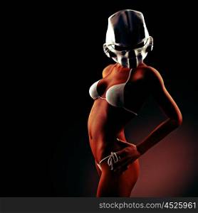 Beautiful young woman with futuristic helmet and bikini
