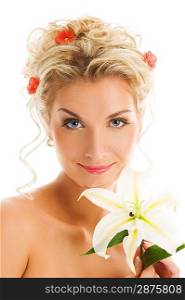 Beautiful young woman with lily flower. Close-up portrait
