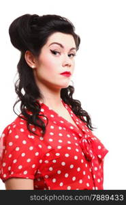 Beautiful young woman with pin-up make-up and hairstyle posing in studio