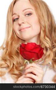beautiful young woman with red rose, close-up portrait
