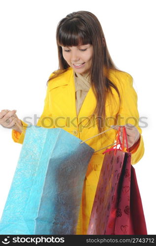 beautiful young woman with shopping bags. Isolated on white background