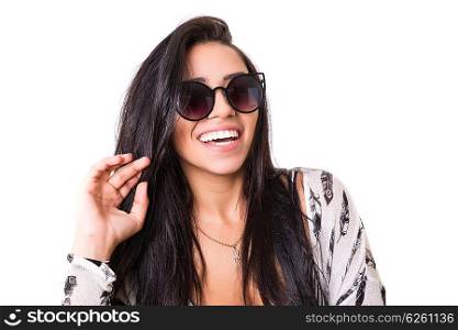 Beautiful young woman with sunglasses posing in studio, isolated over white