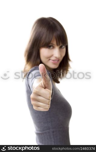 Beautiful young woman with thumbs up, isolated on a white background