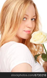 beautiful young woman with white rose, close-up portrait
