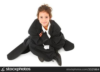 Beautifull six year old french american girl in over sized business suit.
