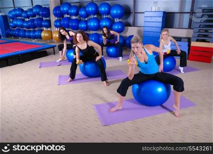 beautifull young girls working out in a gym