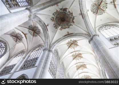 beautifully decorated arched ceiling of breda cathedral in the netherlands