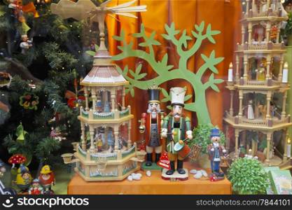 Beautifully decorated Christmas window, displaying hand made wooden decorations in Belgium, Europe