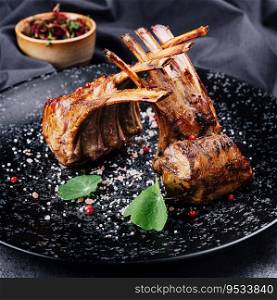 Beautifully grilled lamb rib chop steaks on plate