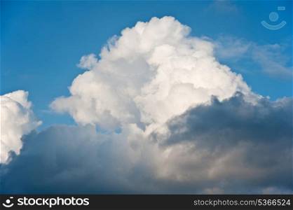 Beauttiful natural fluffy white cloud formations in blue sky