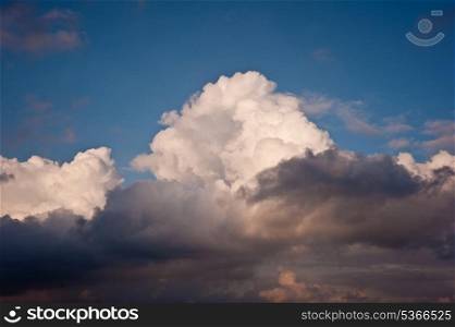 Beauttiful natural fluffy white cloud formations in blue sky