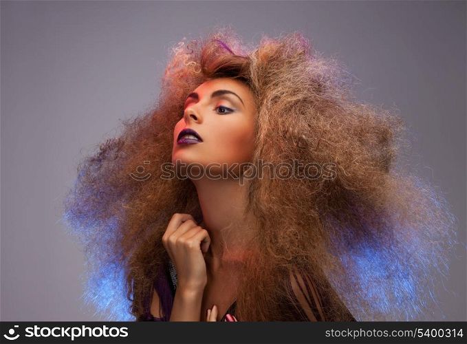 beauty and glamour concept - woman with long curly hair